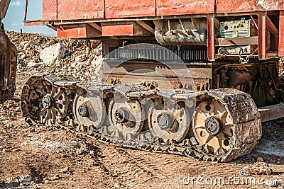 Caterpillars or tracks of large industrial excavator Stock Photo