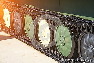 Caterpillars with wheels on a military tank, close up view Stock Photo