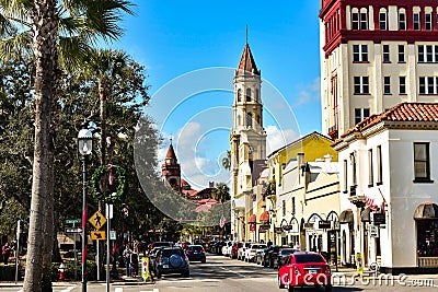 Cathedral Basilica of St. Augustine , Plaza de la Constitucion and partial view of Henry Flager College at Old Town in Florida`s H Editorial Stock Photo