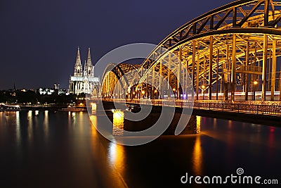 Cathedral of Cologne and iron bridge over Rhine river Stock Photo