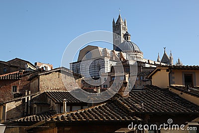 The Cathedral looking out of tiled roofs, Florence, Italy Editorial Stock Photo