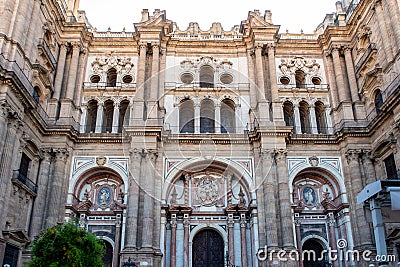 The Cathedral of Malaga front symmetrical view. Medieval Roman Catholic church in renaissance style with baroque facade, Spain. Stock Photo