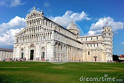 The Cathedral of Pisa and the Pisa Tower in Pisa, Italy. The leaning tower of Pisa is one of the most famous tourist destinations Stock Photo