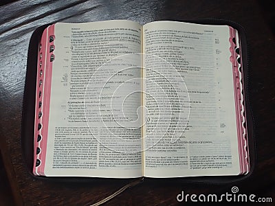 A Catholic bible on top of a table for prayer Stock Photo