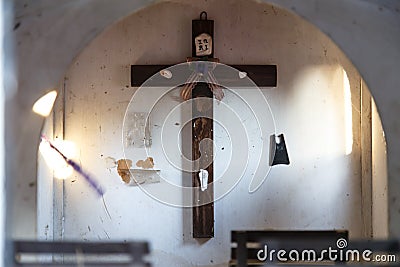 Catholic church cross detail indoors Stock Photo