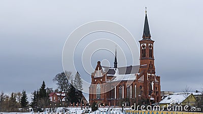 Catholic church of St. Anthony of Padua in Pastavy in winter. Monument of architecture in the neo-Gothic style. Stock Photo