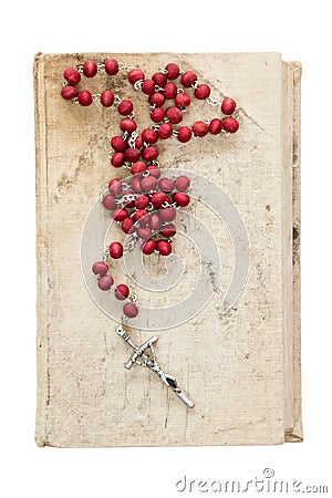 Catholic rosary on old book Stock Photo