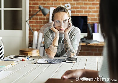Caucasain woman with thoughful face expression Stock Photo
