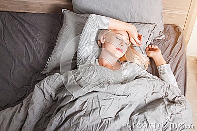 Sleep. Young Woman Sleeping In Bed Stock Photo