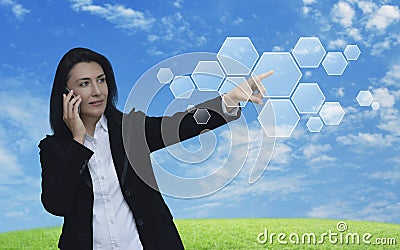 Caucasian businesswoman hand pushing blank hexagon shape virtual Stock Photo