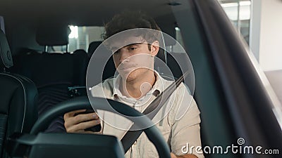 Caucasian confused sad driver upset puzzled male businessman frustrated man stressed business employer in car auto Stock Photo