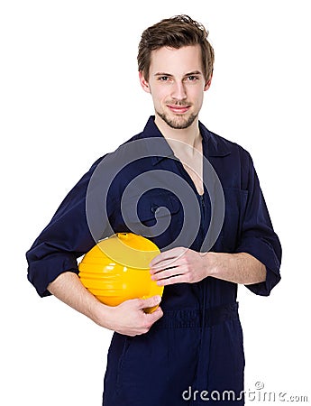 Caucasian engineer hold with yellow hard hat Stock Photo