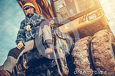 Caucasian Excavator Operator Stock Photo