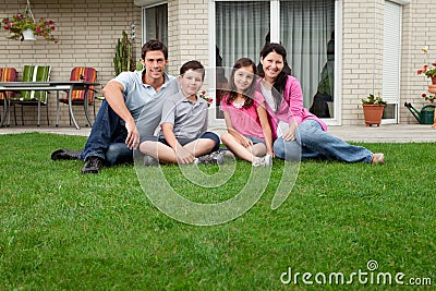 Caucasian family portrait sitting Stock Photo