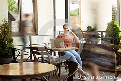 Caucasian female inclusive plus-size model in her daily routine. Realness, tolerance, lifestyle Stock Photo