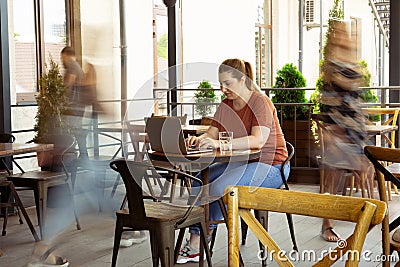 Caucasian female inclusive plus-size model in her daily routine. Realness, tolerance, lifestyle Stock Photo