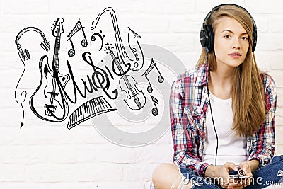 Caucasian female listening to music Stock Photo