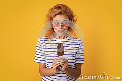 caucasian girl with icelolly ice cream on background. photo of girl with icelolly ice cream Stock Photo