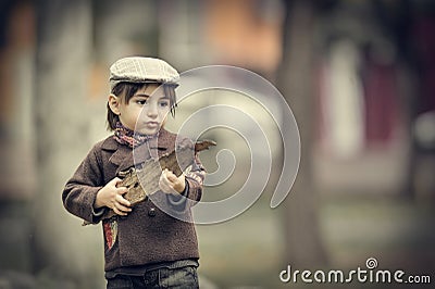 Caucasian little boy in a summer hat outdoors Stock Photo