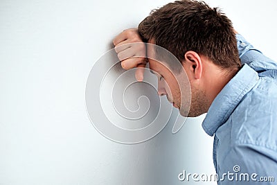 Caucasian man feeling headache or nausea. Stock Photo