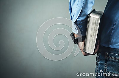 Caucasian man holding bible Stock Photo