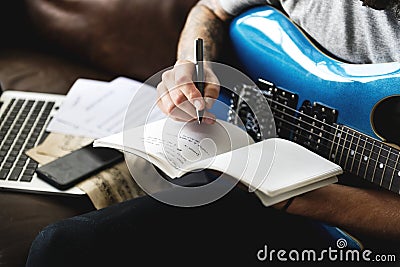 Caucasian man in a songwriting process Stock Photo
