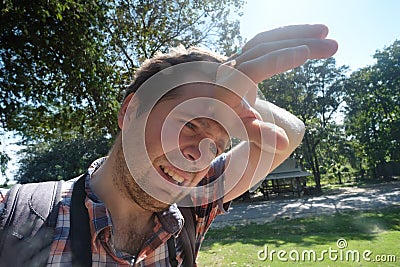 Caucasian man under hot bright sun. Stock Photo