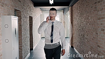 Caucasian man speaking on his mobile phone. Stock Photo