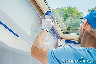 Preparing Room Window Edges For Painting Job Stock Photo