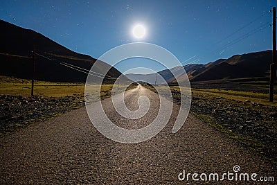 Moon Light Road in Caucasian Mountains Stock Photo
