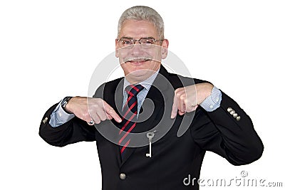 A caucasian senior manager pointing at a key Stock Photo