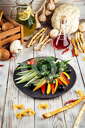 Caucasian snack fresh vegetables cheese and olives Stock Photo
