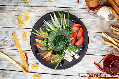 Caucasian snack fresh vegetables cheese and olives Stock Photo