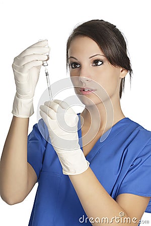 Caucasian doctor or nurse with hypodermic syringe Stock Photo