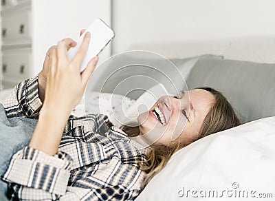 Caucasian woman chatting on mobile phone Stock Photo