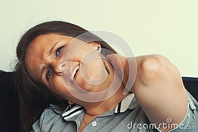 Tired neck. Pain in the neck of female from fatigue Stock Photo