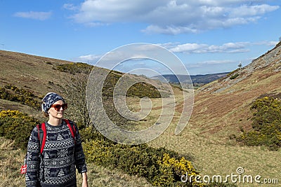 Caucasian woman trekking around Lauder Stock Photo