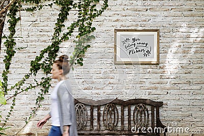 Caucasian woman waking at vintage cafe Stock Photo
