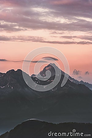 Caucasus mountains peaks and clouds sunset Landscape Stock Photo