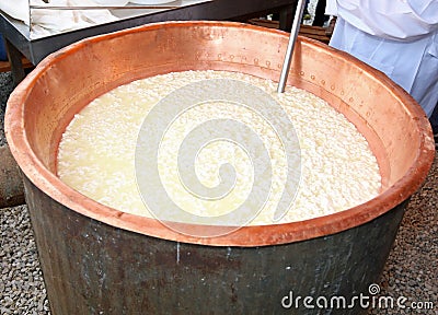 cauldron with the curdled milk to make cheese Stock Photo