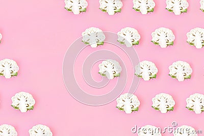 Cauliflower seamless pattern on a pink pastel background. Stock Photo