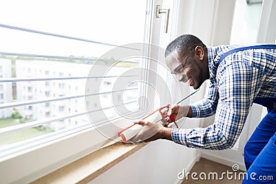 Caulk Sealant Application. Silicone Window Seal Stock Photo