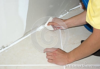 Caulking mass (silicone) Stock Photo