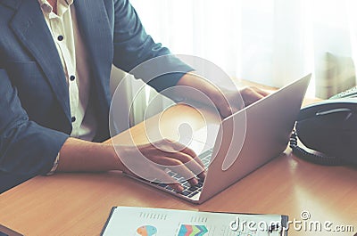 Causal worker hand typing using laptop Stock Photo