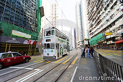 Causeway Bay, Hong Kong - 23 November 2018: Double-decker tram Trams are also a major tourist attraction and one of the best eco- Editorial Stock Photo