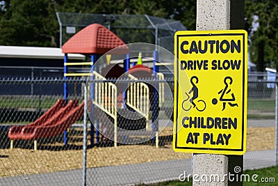 Caution Drive Slow Playground Stock Photo