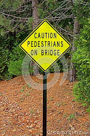 Caution Pedestrians On Bridge Sign Stock Photo