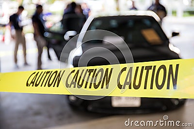 caution tape protect vehicle in crime scene investigation training course Stock Photo