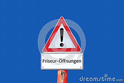 Caution warning sign hairdresser openings on blue background in german Stock Photo