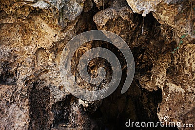 Cave entrance, rock of different shades Stock Photo